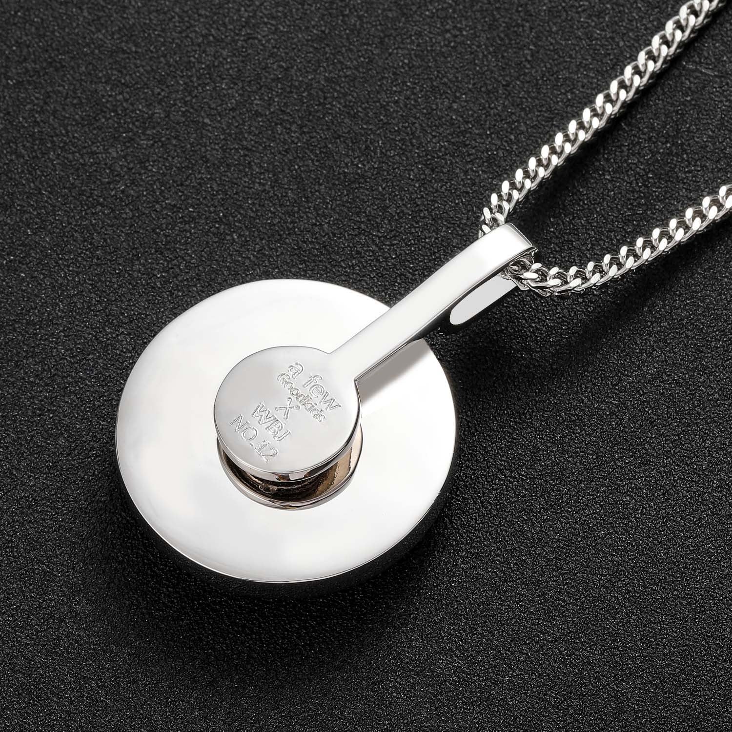 iced out spinning pendant
