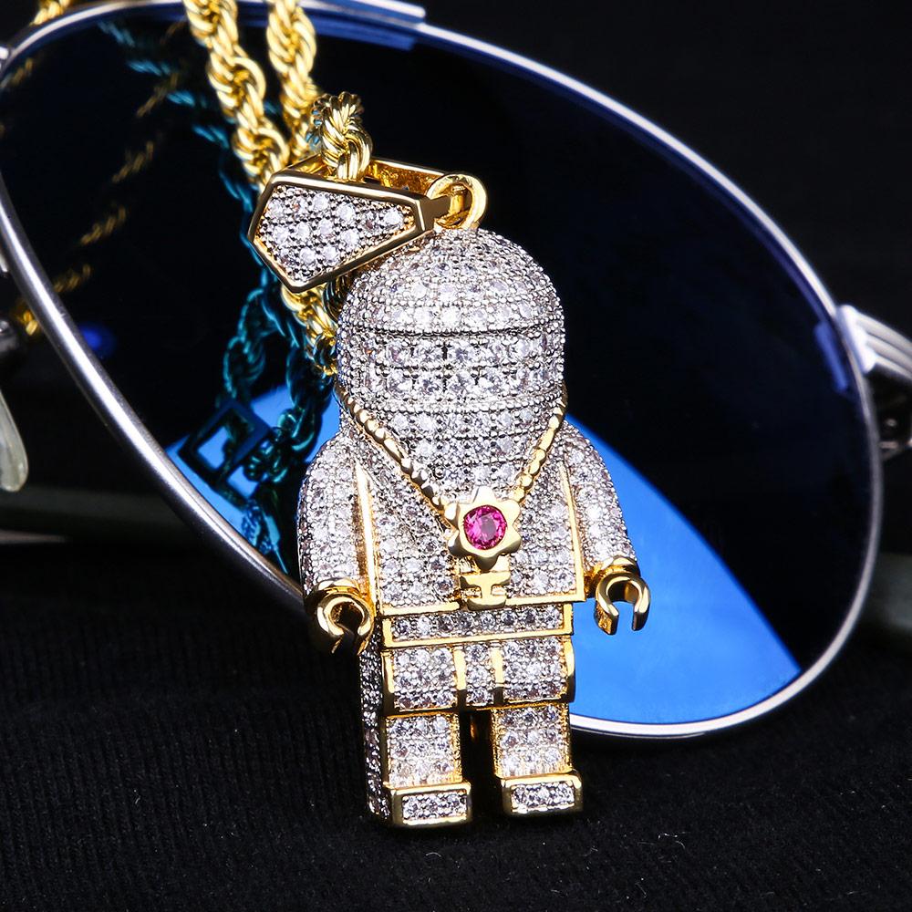 gold astronaut pendant