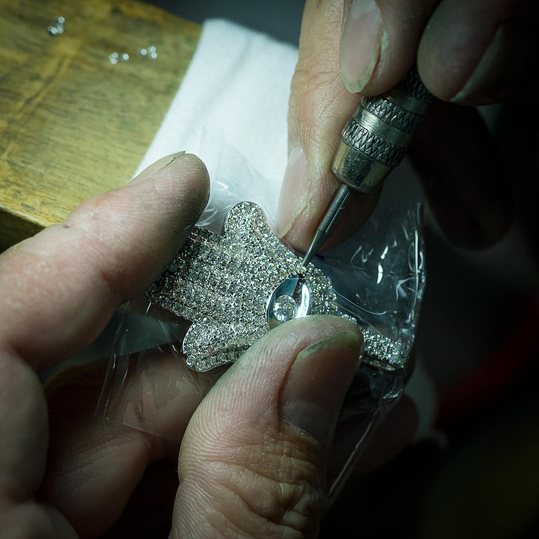 white gold hamsa pendant