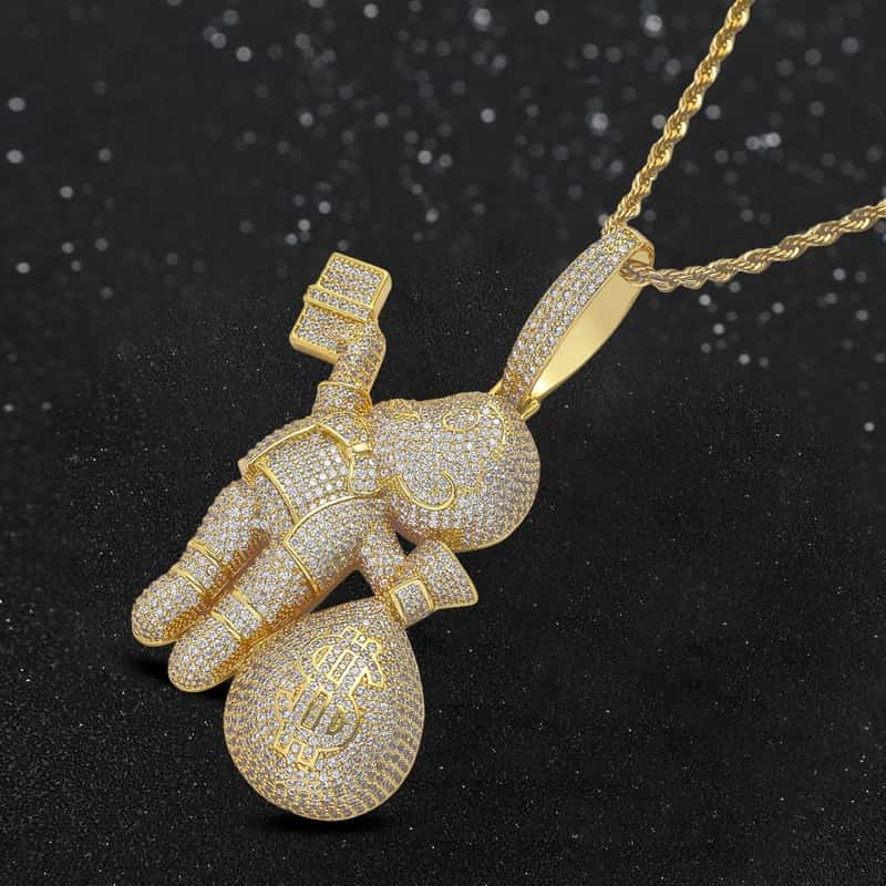 holding dollar pendant gold